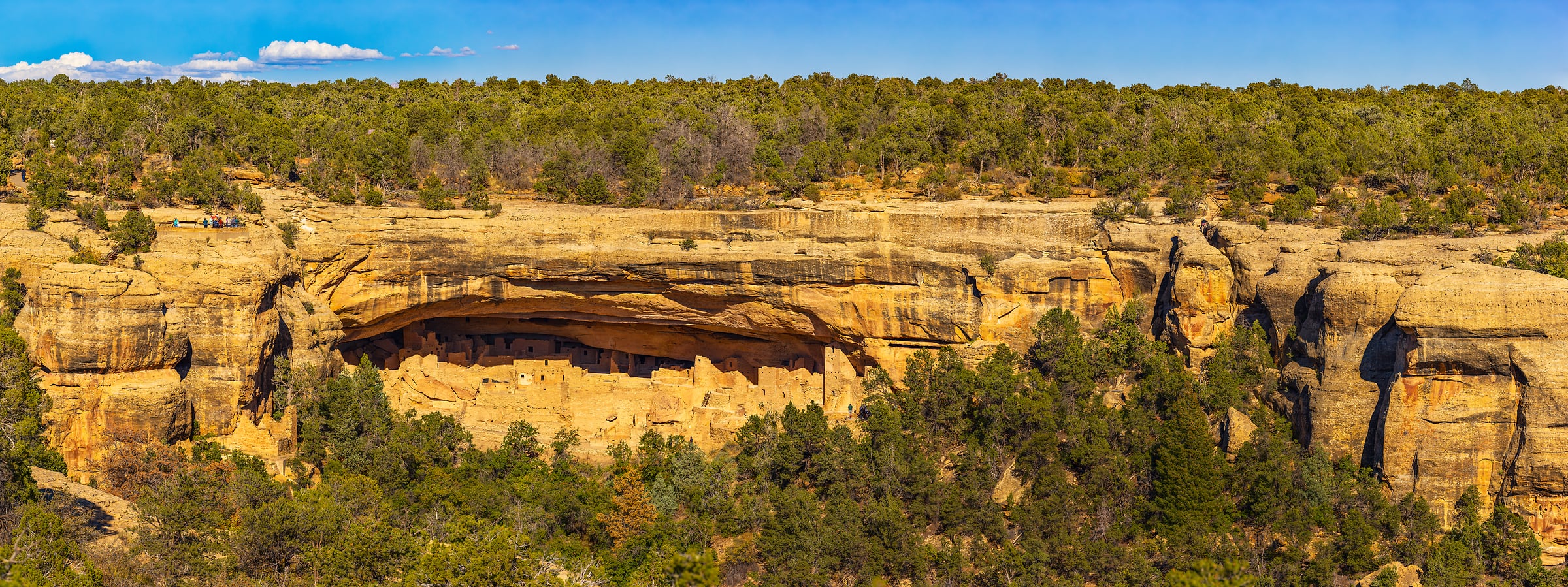 2,771 megapixels! A very high resolution, panorama photo of Native American dwellings in a cliffside; archeological photograph created by John Freeman in from Sun Temple Overlook in Mesa Verde National Park, Colorado.