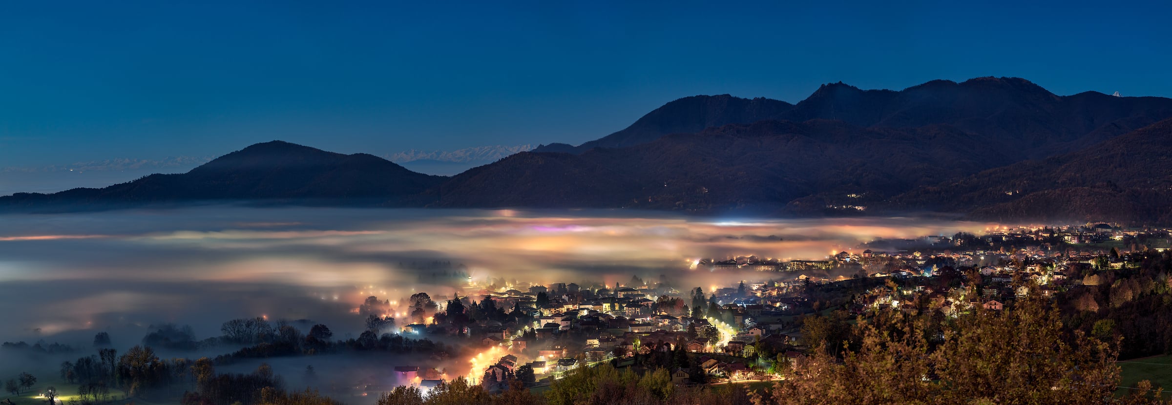 203 megapixels! A very high resolution, large-format VAST photo print of Giaveno, Turin, Italy at night with fog and mountains; photograph created by Duilio Fiorille.