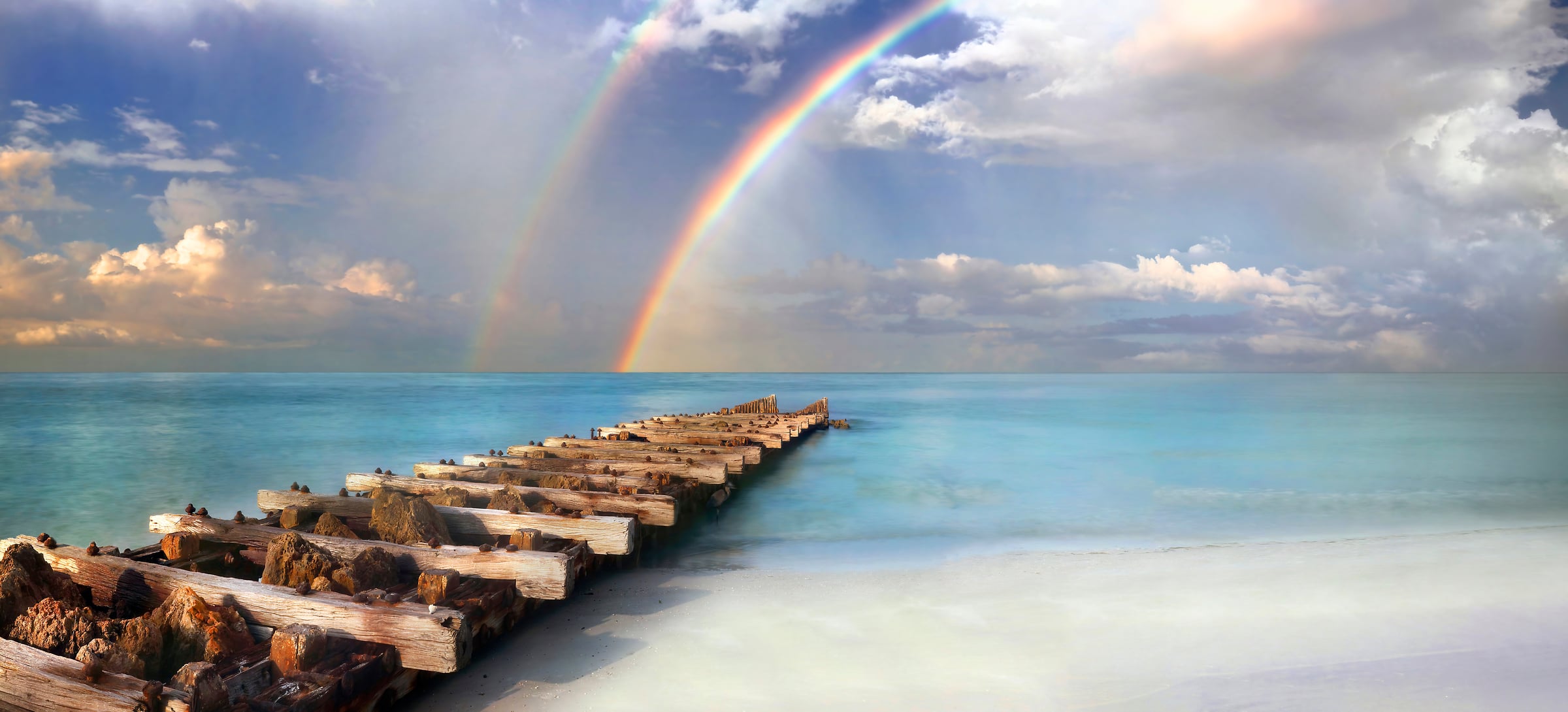 249 megapixels! A very high resolution, large-format VAST photo print of a rainbow on a beach with the ocean; landscape photograph created by Phil Crawshay in Coquina Beach, Bradenton, Florida.