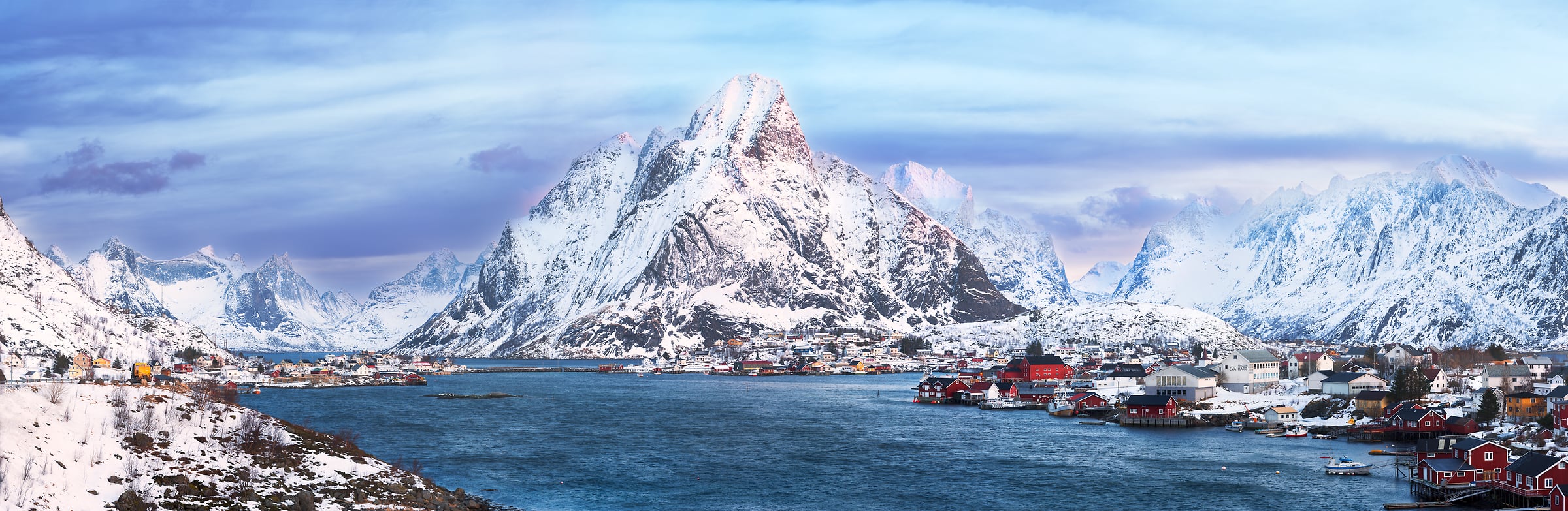1,000 megapixels! A very high definition, large-format VAST photo print of a mountain landscape with a town and the ocean; landscape photograph created by Ennio Pozzetti in Reine, Lofoten, Norway.