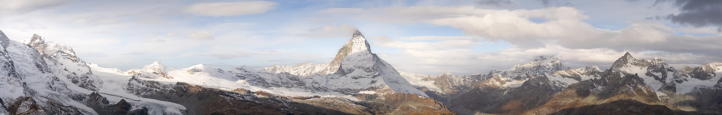 218 megapixels! A very high resolution, wide panorama photo of the Alps mountain range with The Matterhorn in the center; landscape photograph created by Jeff Lewis in Zermatt, Switzerland.