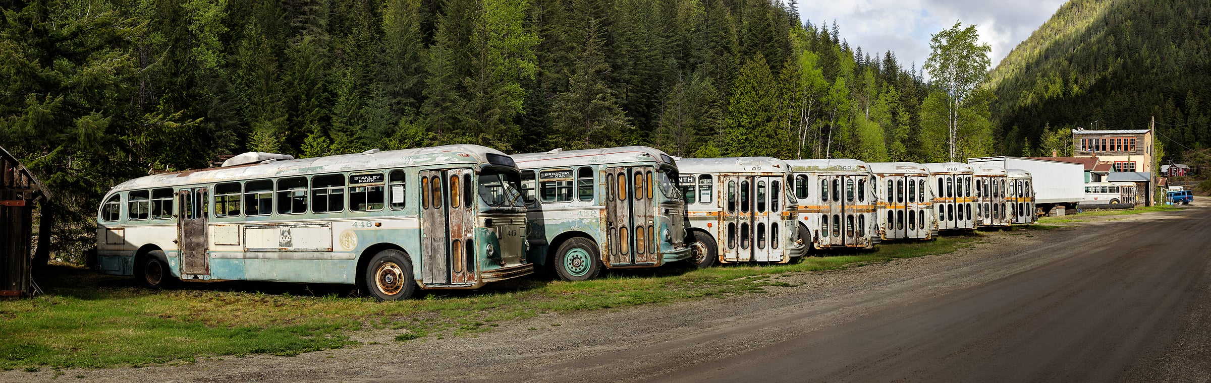 1,478 megapixels! A very high resolution, large-format VAST photo print of a group of old buses lined up; fine art photograph created by Scott Dimond in Sandon, British Columbia, Canada.