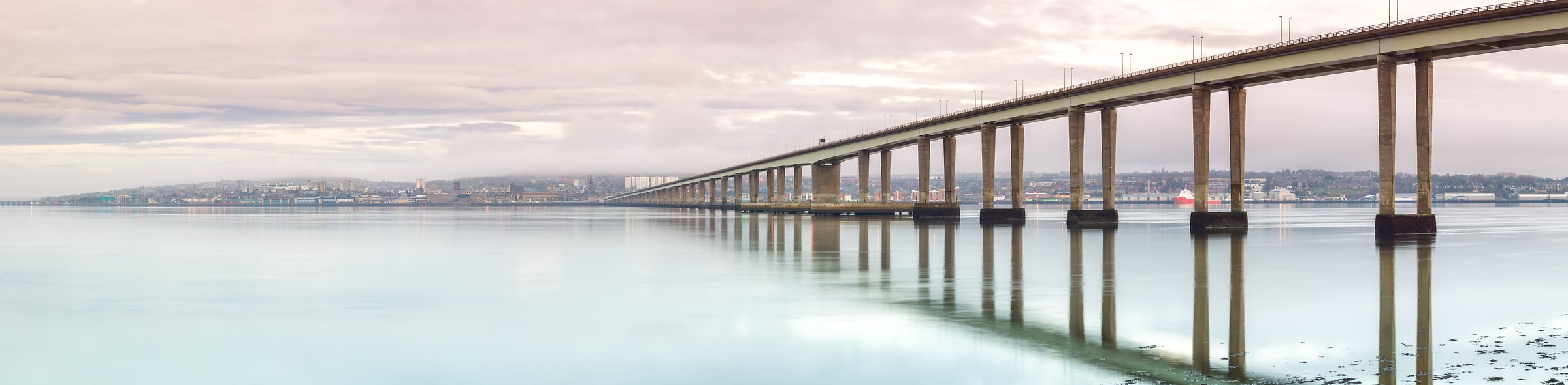 235 megapixels! A very high resolution, large-format panorama photo of a bridge causeway over beautiful water; photograph created by Assaf Frank at Tay Road Bridge in Dundee, Scotland.