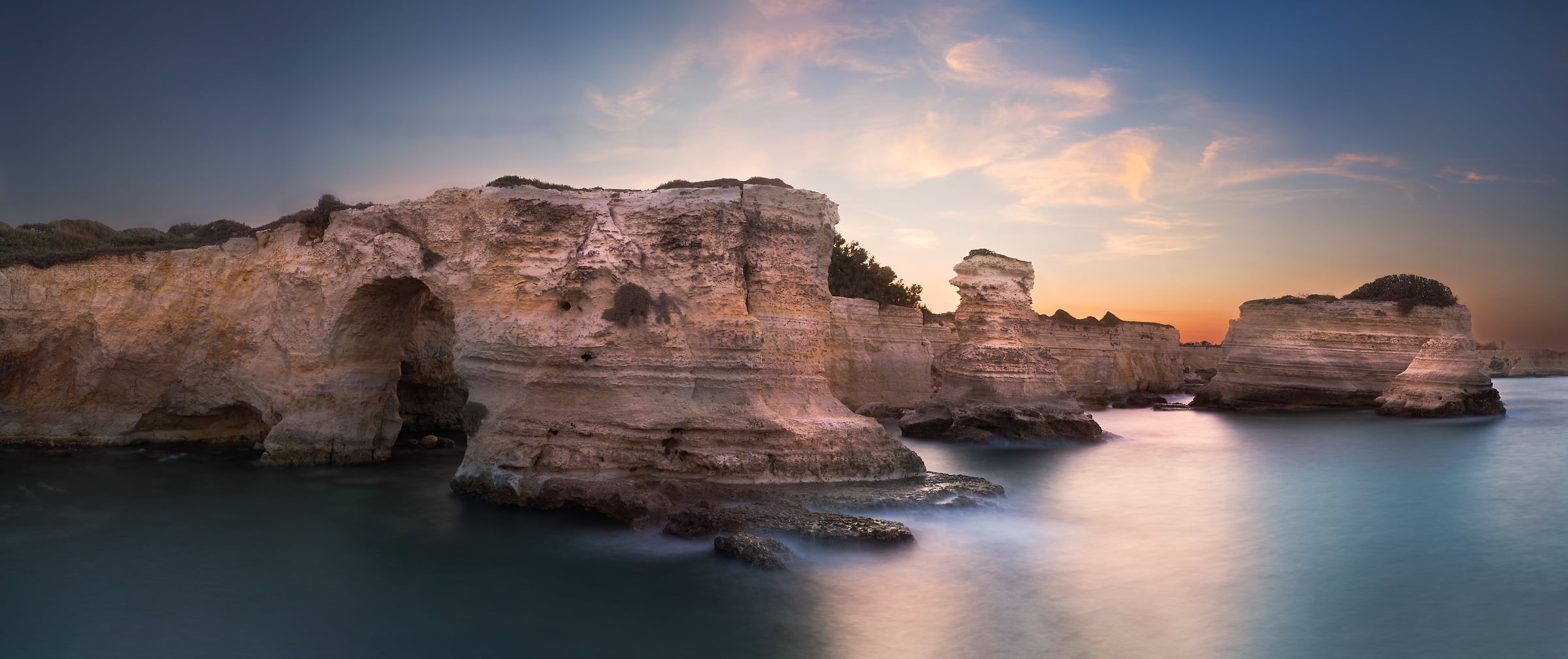 1,050 megapixels! A very high resolution, large-format VAST photo print of cliffs along a coastline at sunset; seascape photograph created by Francesco Emanuele Carucci in Faraglioni di Sant'Andrea, Puglia, Italy.