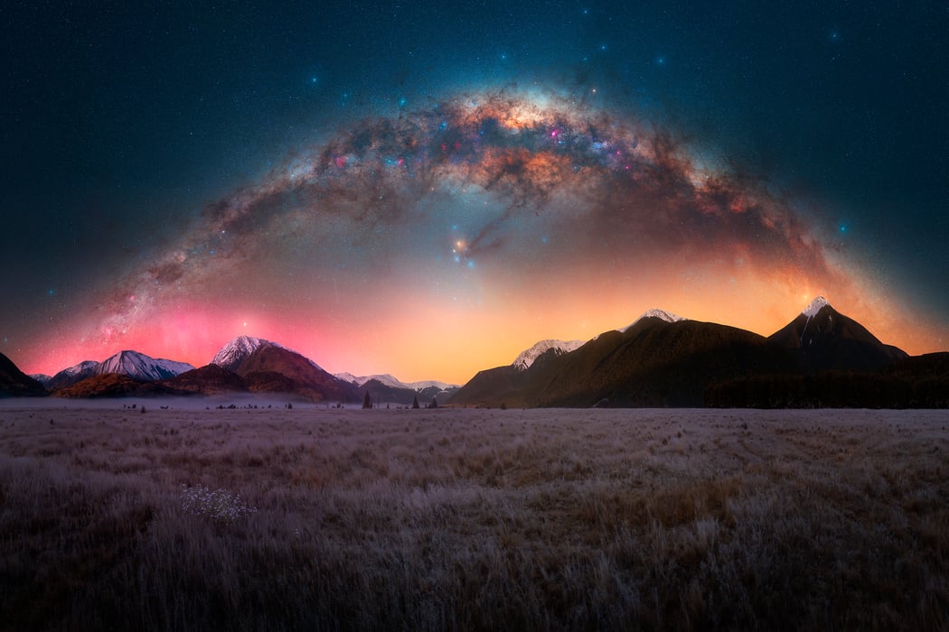 341 megapixels! A very high resolution, large-format VAST photo print of a beautiful landscape with mountains and a field at night with the Milky Way in the sky; fine art photograph created by Paul Wilson in Arthur's Pass, New Zealand.