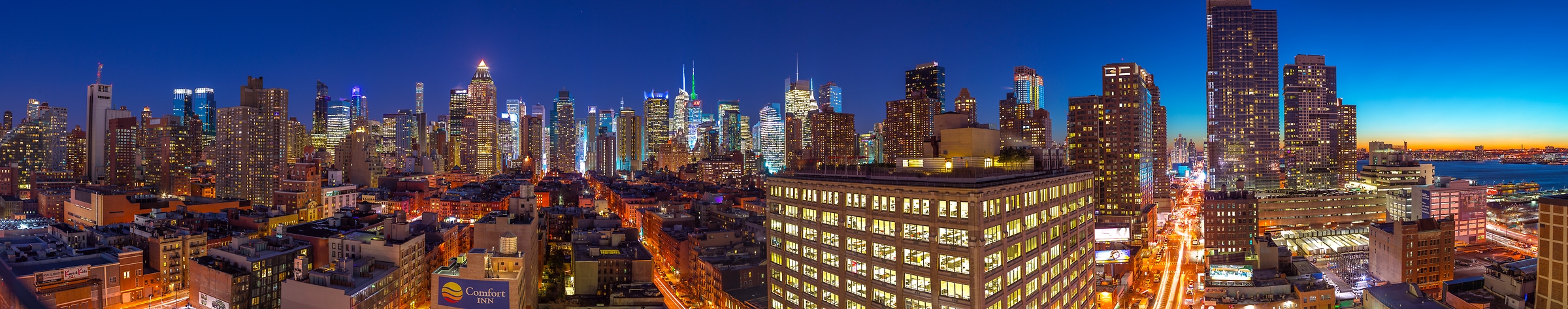 121 megapixels! A very high resolution, large-format panorama photo of an urban skyline at night; photograph created by Assaf Frank in Lower Manhattan, New York City.