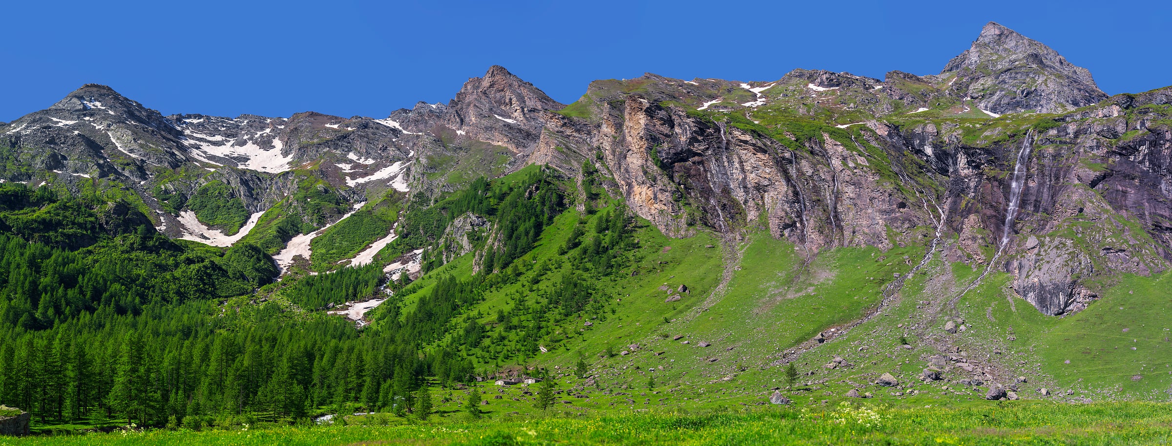 5,093 megapixels! A very high resolution, large-format VAST photo print of The Alps mountains in summer with green grass, lush trees, waterfalls, and mountain peaks; gigapixel landscape photograph created by Duilio Fiorille in Via Capoluogo, Balme, Turin, Italy.