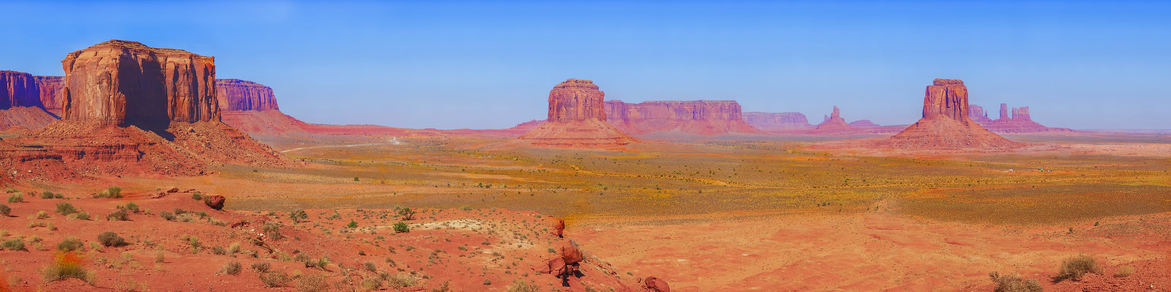 5,293 megapixels! A very high resolution, gigapixel panorama photo of a desert landscape with large rock formations; photograph created by John Freeman from Artist's Point in Monument Valley, Arizona.