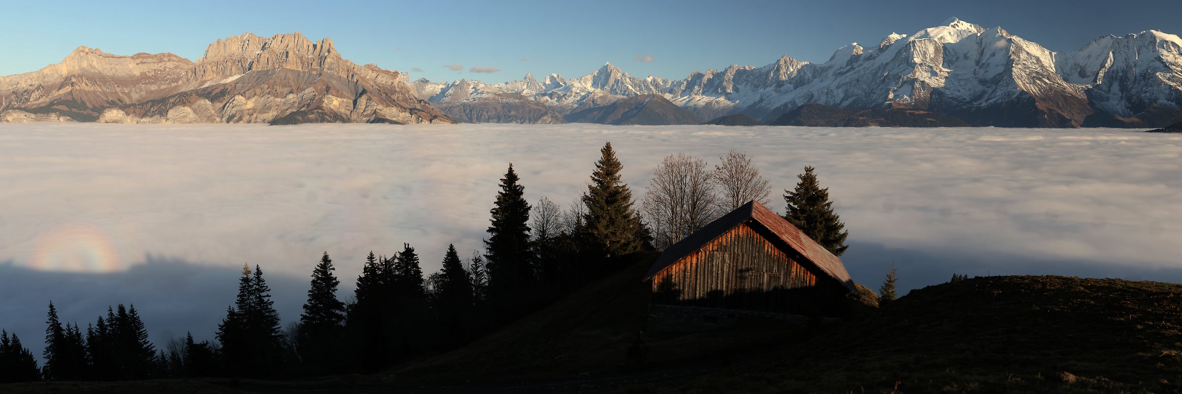 1,297 megapixels! A very high resolution, large-format VAST photo print of a ridge of mountains rising above the clouds; panorama photograph created by Alexandre Deschaumes.