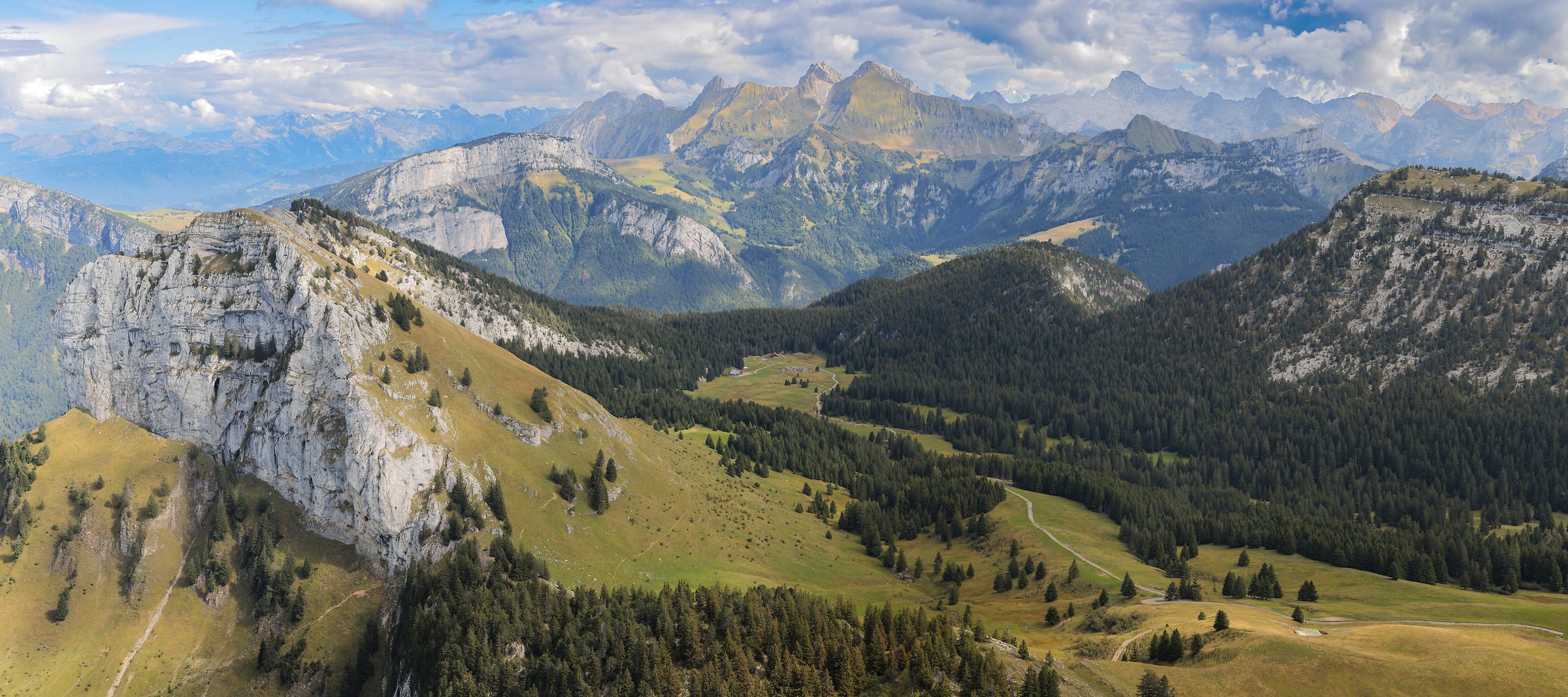 306 megapixels! A very high resolution, large-format VAST photo of a landscape in Haute-Savoie, France with mountains, hills, and forests; photograph created by Alexandre Deschaumes.