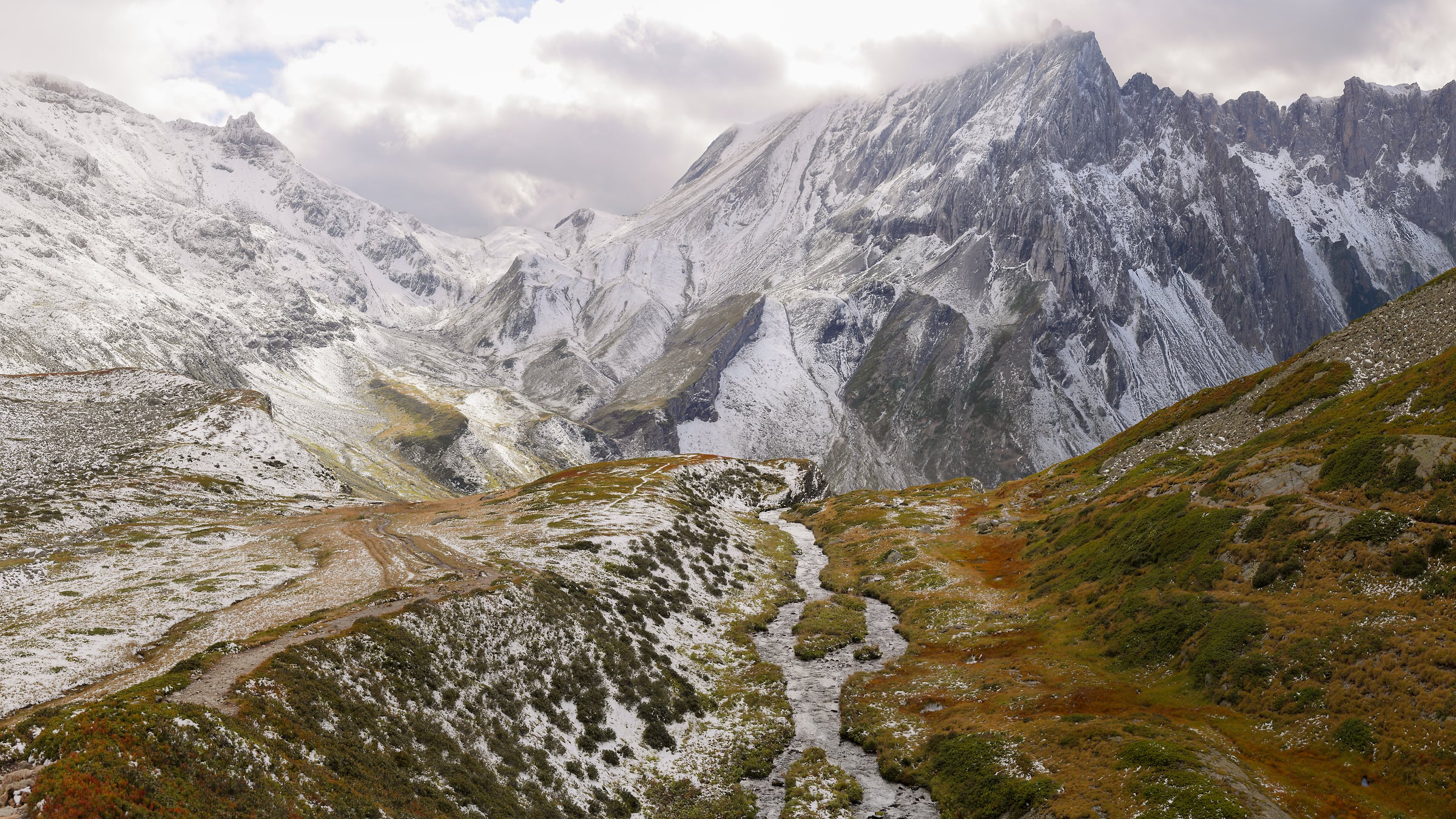 280 megapixels! A very high resolution, large-format VAST photo print of a hiking trail in an alpine environment with a stream and snow-covered mountains; landscape photograph created by Alexandre Deschaumes.