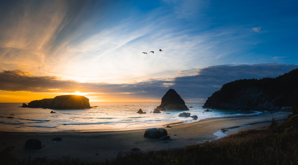 176 megapixels! A very high resolution, large-format VAST photo print of a sunset on the Oregon coast with the beach in the foreground and the Pacific Ocean and large rock formations in the background; seascape photograph created by Justin Katz in Whaleshead Viewpoint, Brookings, Oregon.