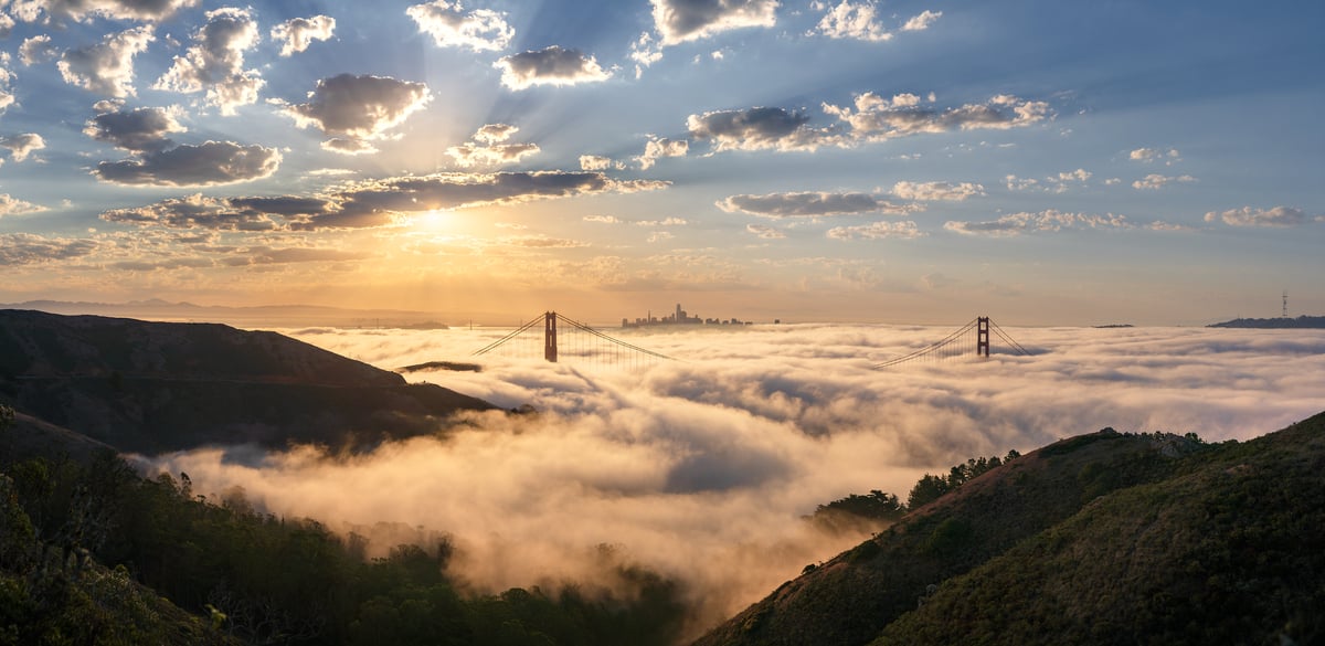349 megapixels! A very high resolution, large-format VAST photo print of sunrise over the Golden Gate Bridge and the San Francisco skyline with beautiful fog filling the San Francisco bay and the Marin Headlands in the foreground; fine art sunrise photograph created by Jeff Lewis in San Francisco, California.